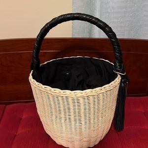 KONTESSA WICKER HAND BAG WITH A LEATHER HANDLE.  TASSLE AND 2 BAGS NWT
